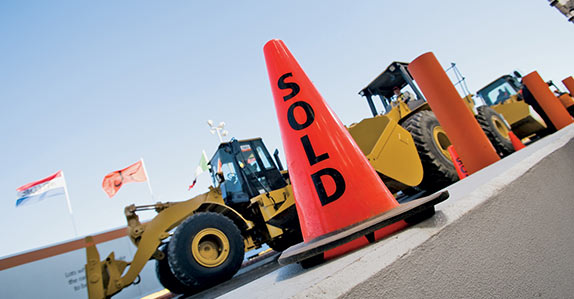 Heavy equipment selling at a Ritchie Bros. unreserved public auction. Heavy equipment selling at a Ritchie Bros. unreserved public auction.